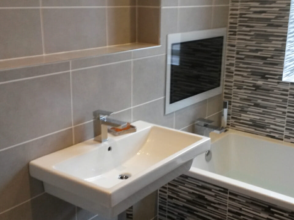 Contemporary Mixer Taps with Tiled Bathroom & Bath Panel