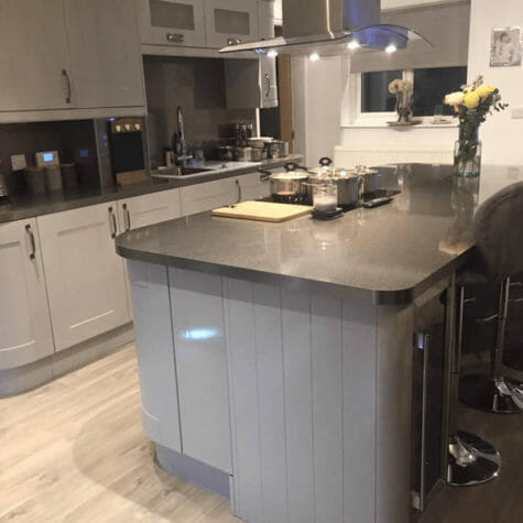 Contemporary Grey Kitchen with Stainless Steel Accessories