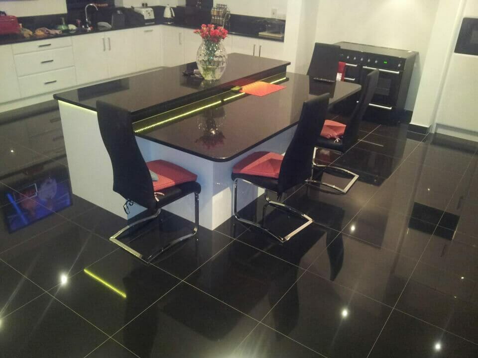 White Gloss Fitted Kitchen with Mirror Gloss Floor Tiles